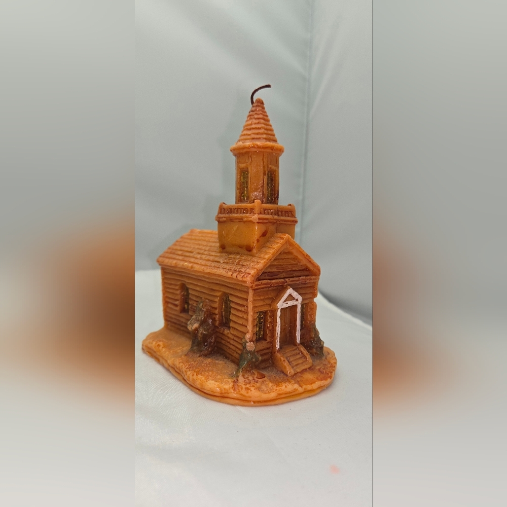 Log cabin style church was candle